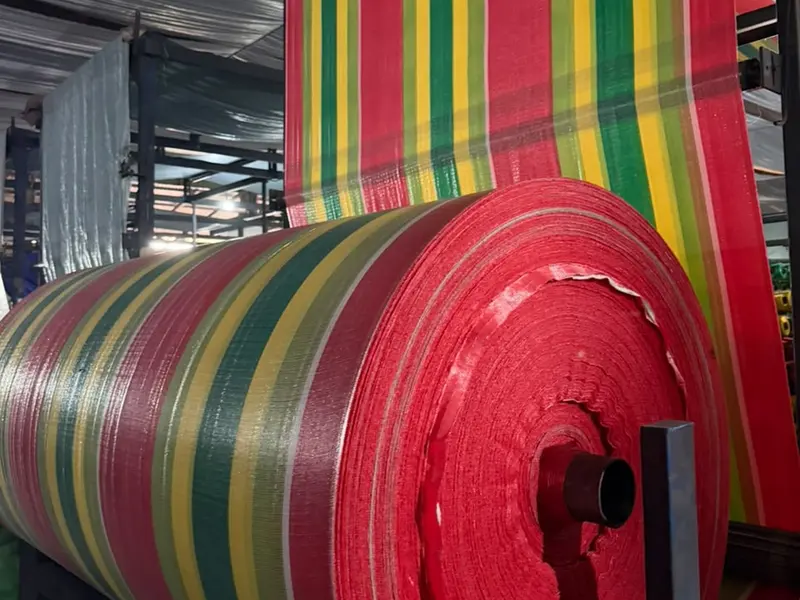 Roll terpal salur pelangi merah-kuning-hijau produksi YO TERPAL NUSANTARA RAYA